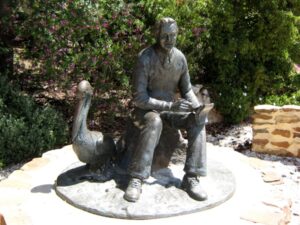 Eudunda Gardens Colin Thiele with Percival - Sculpture by Chris Radford