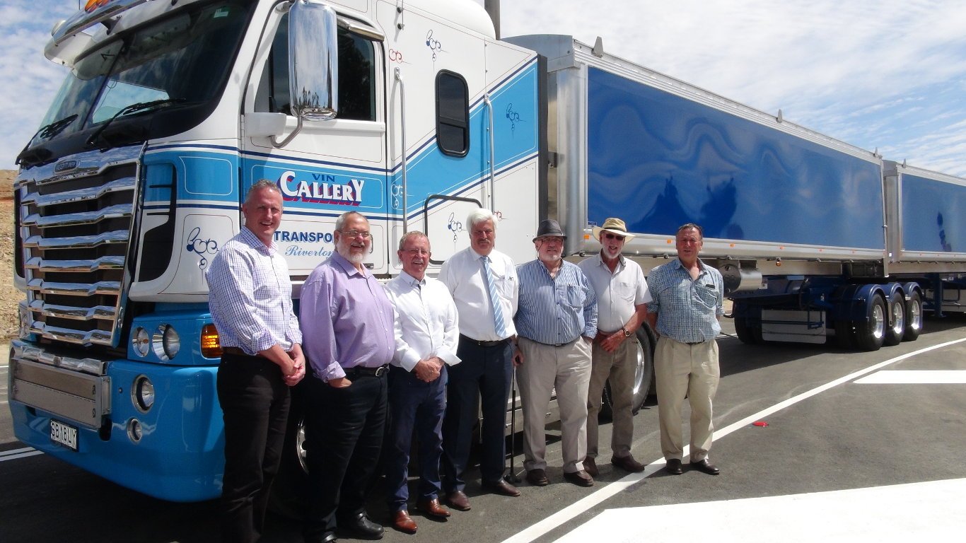 Officials in front of B-Double at Heavy Vehicle Bypass Opening